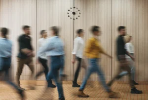 Group Of Office People Walking At Office Open Space. Team Of Business Employees At Coworking Center. People At Motion Blur. Concept Working At Action